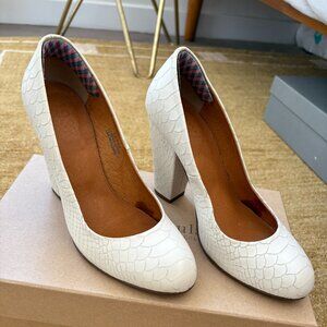 Vintage-inspired embossed leather white block heels